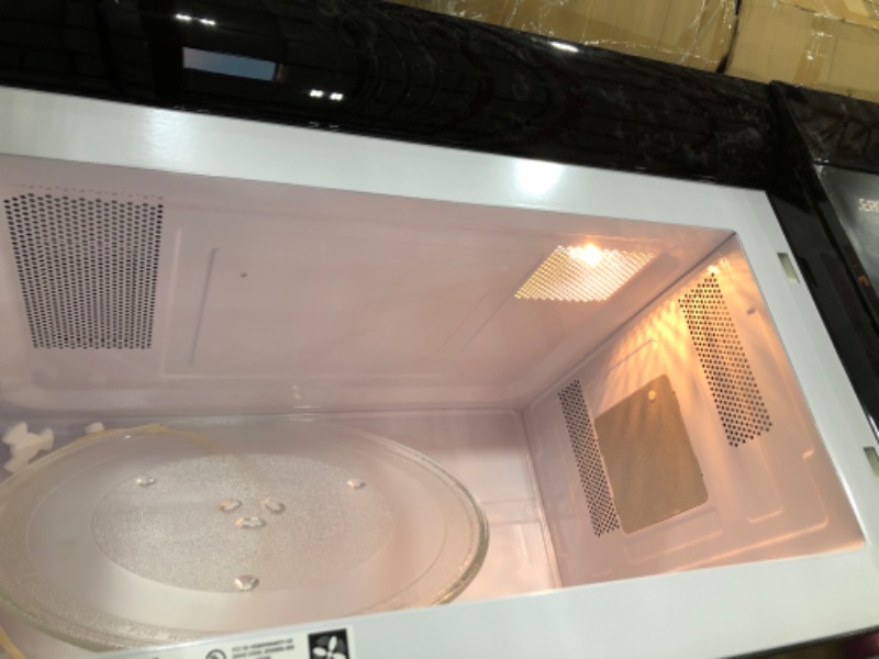 Photo 3 of GE® 1.6 Cu. Ft. Over-the-Range Microwave Oven