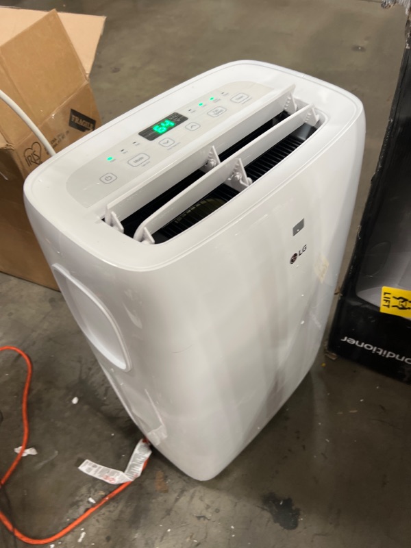 Photo 3 of 6,000 BTU (DOE) 115-Volt Portable Air Conditioner with Dehumidifier Function and LCD Remote in White