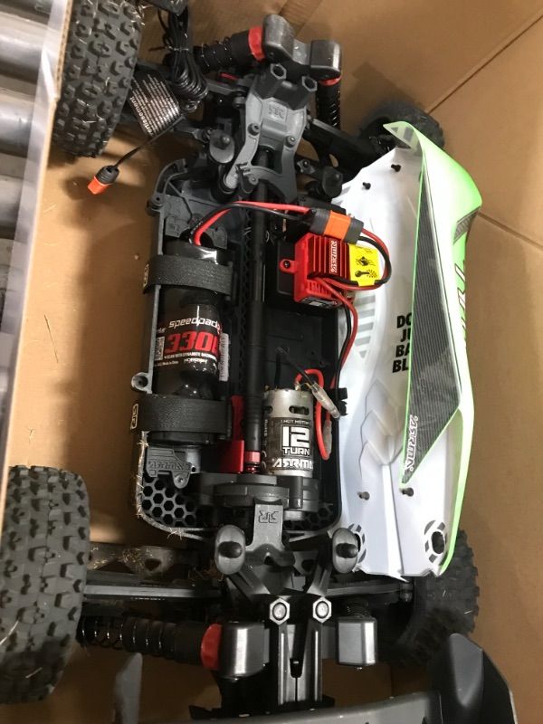 Photo 4 of ARRMA 1/10 Typhon 4X4 V3 MEGA 550 Brushed Buggy RC Truck RTR (Transmitter, Receiver, NiMH Battery and Charger Included), Green, ARA4206V