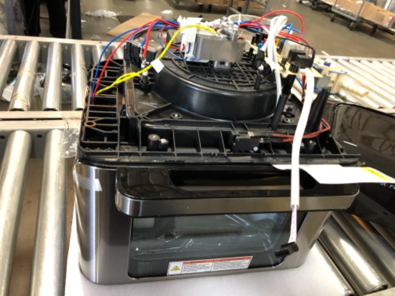 Photo 1 of Parts only --- Instant Vortex Pro 10 Quart Air Fryer, Rotisserie and Convection Oven, Air Fry, Roast, Broil, Bake, Toast, Reheat and Dehydrate, 1500W, Stainless Steel and Black
