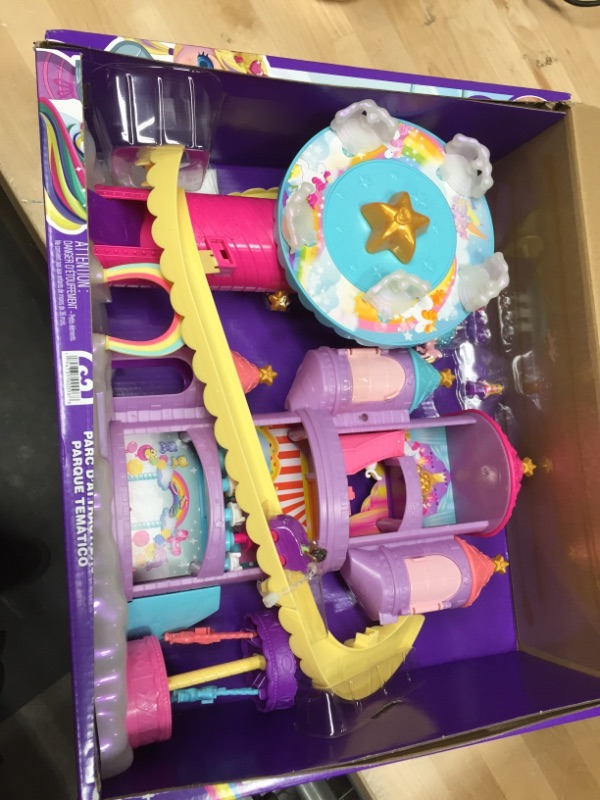 Photo 2 of ?Polly Pocket Rainbow Funland Theme Park, 3 Rides, 7 Play Areas, Polly and Shani Dolls, 2 Unicorns & 25 Surprise Accessories (30 Total Play Pieces), Dispensing Feature for Surprises
