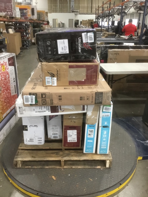 Photo 2 of  PALLET OF ASSORTED DAMAGED TVS AND MONITORS SOLD AS IS NON REFUNDABLE