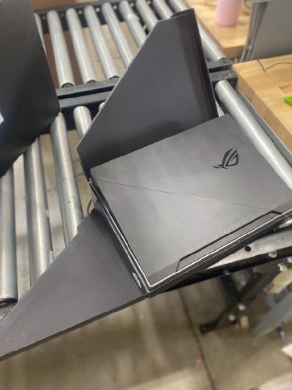 Photo 4 of ASUS ROG Zephyrus Duo SE 15 Gaming & Entertainment Laptop (AMD Ryzen 9 5900HX 8-Core, 32GB RAM, 2TB PCIe SSD, RTX 3080, 15.6" 300Hz Full HD (1920x1080), WiFi, Win 10 Pro) (Renewed)
