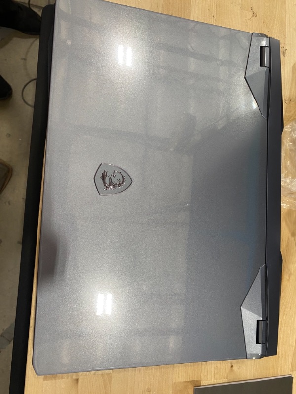 Photo 10 of MSI GE76 Raider 17.3" 360Hz FHD Display, Intel Core i9-11980HK, NVIDIA GeForce RTX3080, 32GB, 1TB NVMe SSD, Win10 ,Titanium Blue (11UH-053)
