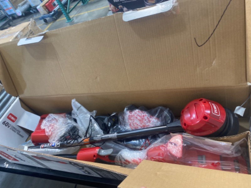 Photo 1 of *BATTERY FAULTY* 60-Volt Max Lithium-Ion Brushless Cordless 15 in. / 13 in. String Trimmer - 2.0 Ah Battery and Charger Included
