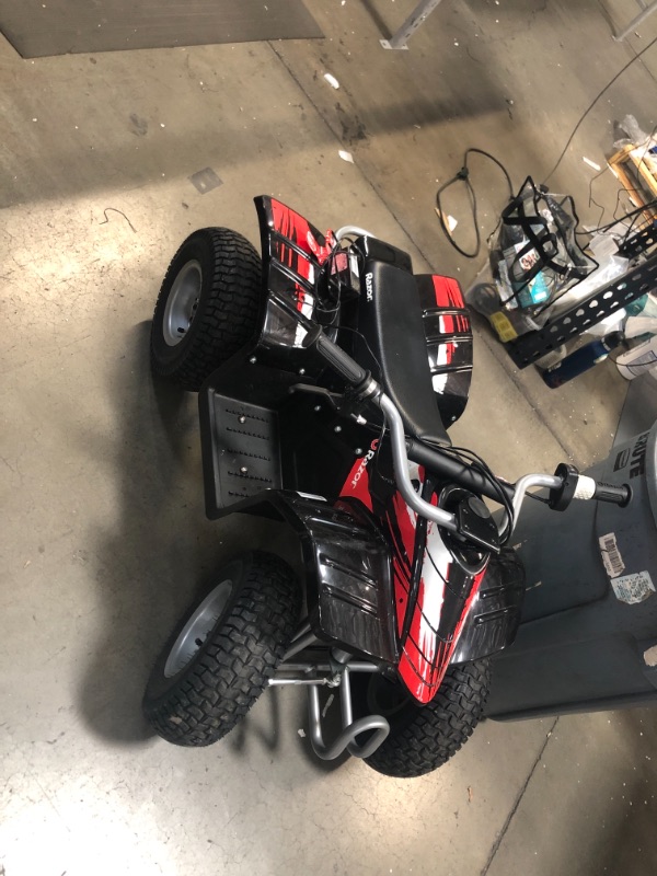 Photo 2 of ***MISSING STEERING MOUNT BRACKET***
 Razor Dirt Quad - 24V Electric 4-Wheeler ATV - Twist-Grip Variable-Speed Acceleration Control, Hand-Operated Disc Brake, 12" Knobby Air-Filled Tires
