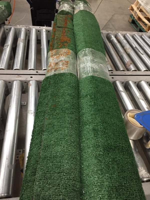 Photo 2 of 2 TrafficMaster
6 ft. x 8 ft. Green Artificial Grass Rug *** DAMAGED WITH RUST SPOTS****