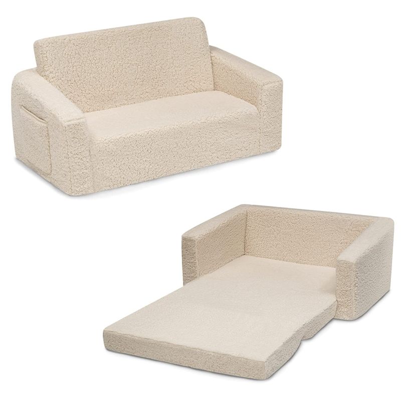 Photo 1 of Delta Children Cozee Flip-Out Sherpa 2-in-1 Convertible Sofa to Lounger for Kids, Cream
