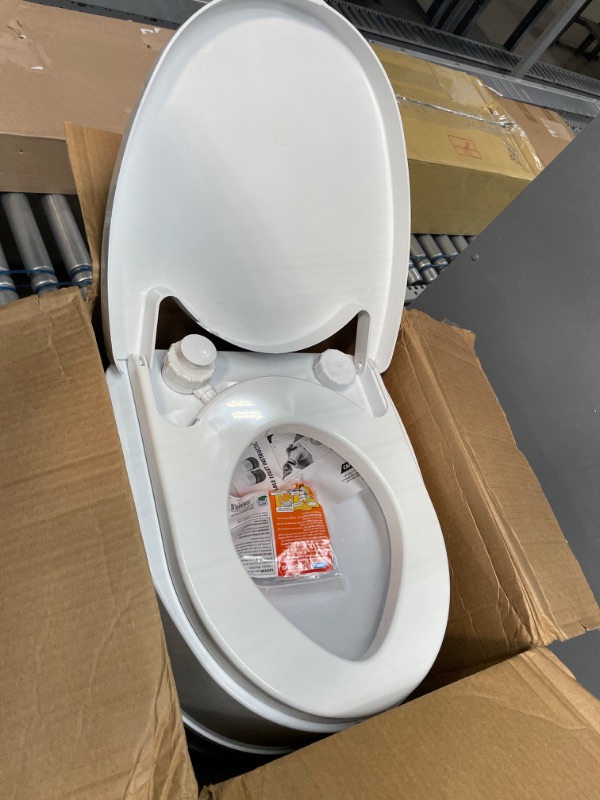 Photo 1 of Camco 41544 Premium Portable Travel Toilet With Three Directional Flush And 5.3