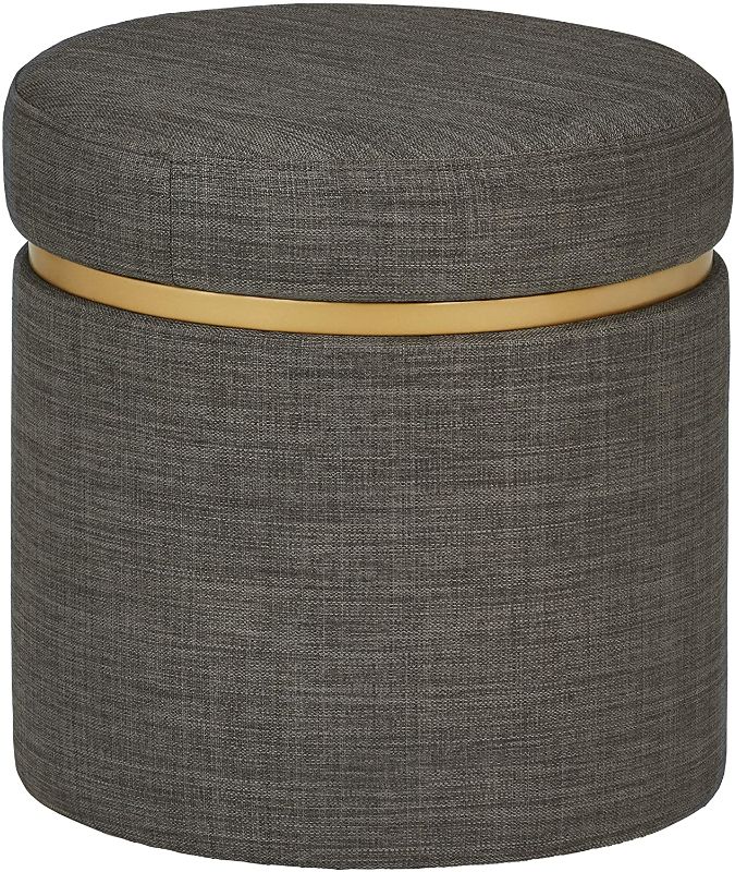 Photo 1 of **WOODEN GOLD RING IS BROKEN, STORAGE OTTOMAN IS BROKEN
Amazon Brand – Rivet Asher Round Upholstered Storage Ottoman, 15.75"W, Dark Grey
