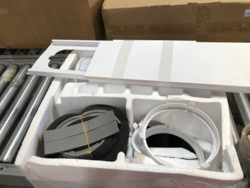 Photo 1 of Midea 10,000 BTU (5,800 BTU SACC) Portable Air Conditioner, Cools up to 200 Sq. Ft., Works as Dehumidifier & Fan, Wi-Fi Enabled, Control with Remote, Amazon Alexa & Google Assistant
