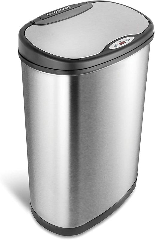 Photo 1 of **DENTED ON SIDE **
Ninestars DZT-50-13 Automatic Touchless Motion Sensor Oval Trash Can with Black Top, 13 gallon/50 L, Stainless Steel
