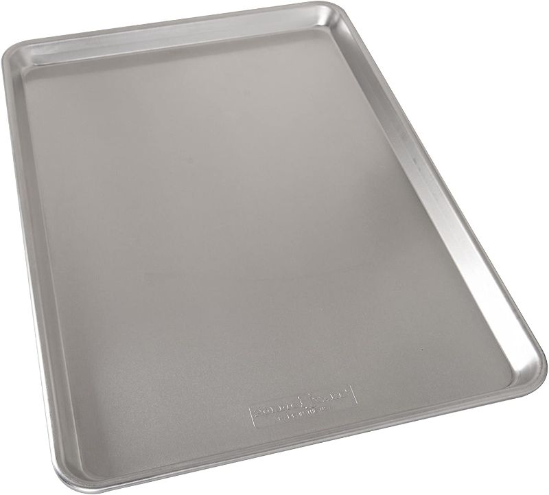 Photo 1 of *SEE last picture for damage*
Nordic Ware Baker's Big Baking Sheet, Silver, 21 x 15 x 1 inches
