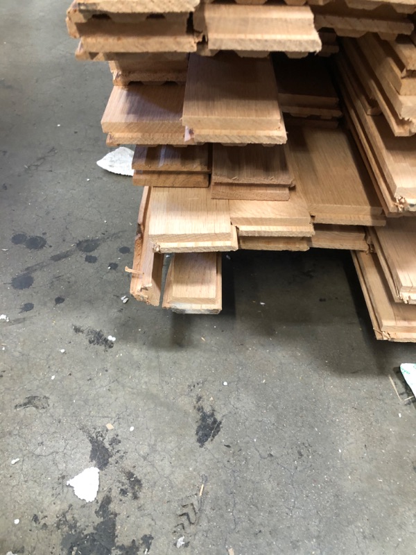 Photo 4 of **SOME PEICES BROKE SOLD AS IS NO RETURNS OR REFUNDS***21/4" SEL RED OAK 19.5 SQ FT PER UNIT 42 UNITS PER SKID
EACH PEICE ABOUT 7 FT LONG 