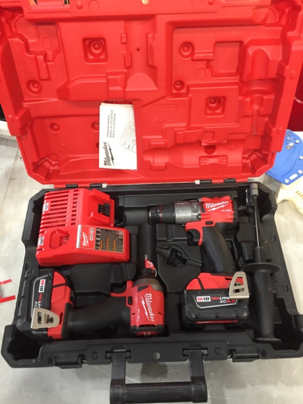 Photo 2 of USED MILWAUKEE 2997-27, 48-11-1852, 48-59-1808 Cordless Combination Kit,7 Tools,18V
