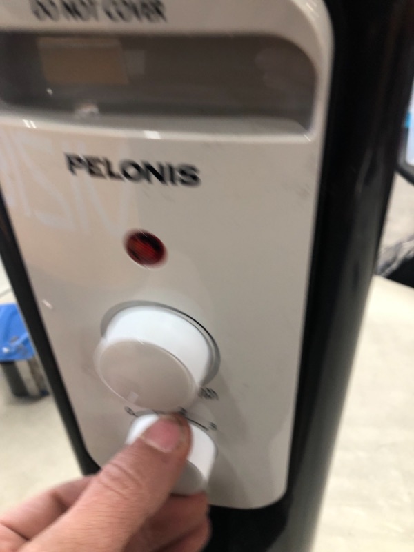 Photo 1 of MISSING WHEELS
PELONIS Electric 1500W Oil Filled Radiator Heater with Safety Protection, LED Display, 3 Heat Settings and Five Temperature settings. Perfect for for Home or Office