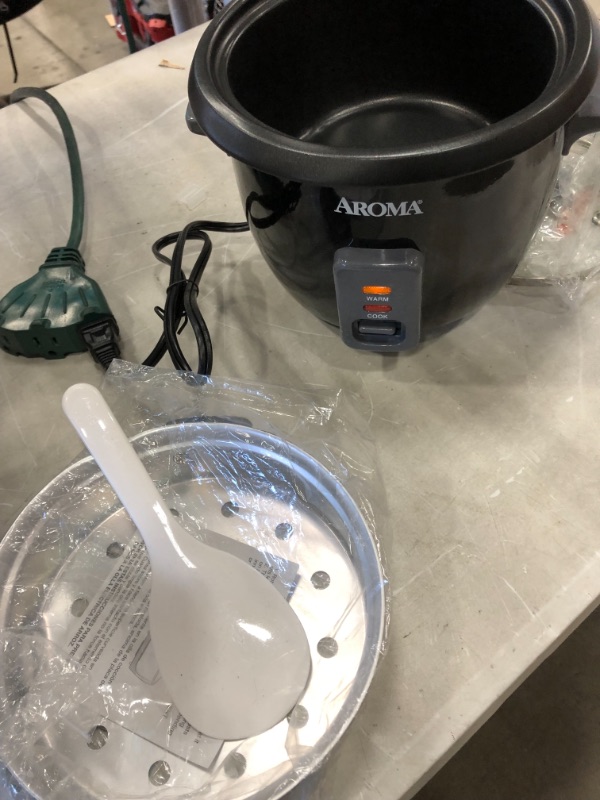 Photo 2 of (MULTIPLE DENTS)
6-Cup Black Rice Cooker with Removable Steam Tray