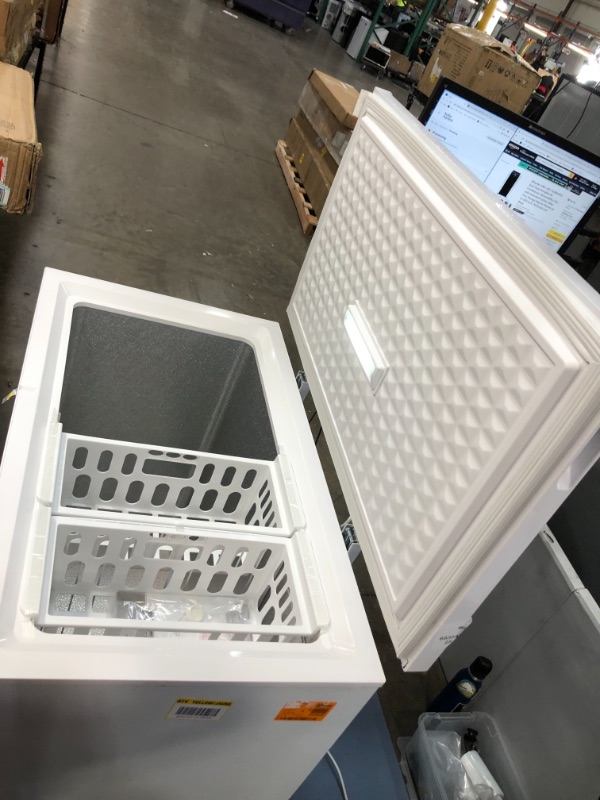Photo 1 of 7.0 cu. ft. Chest Freezer in White
**DAMAGED, WORKS TURNS ON**