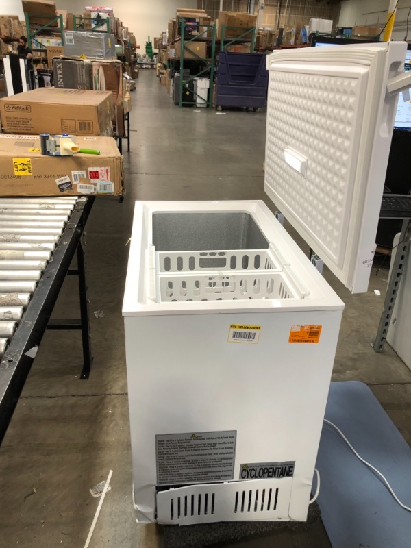 Photo 1 of 7.0 cu. ft. Chest Freezer in White
**DAMAGED, WORKS TURNS ON**