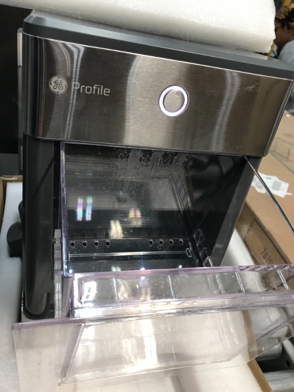 Photo 2 of **USED**
GE Profile Opal | Countertop Nugget Ice Maker with Side Tank | Portable Ice Machine with Bluetooth Connectivity | Smart Home Kitchen Essentials | Stainless Steel Finish | Up to 24 lbs. of Ice Per Day
