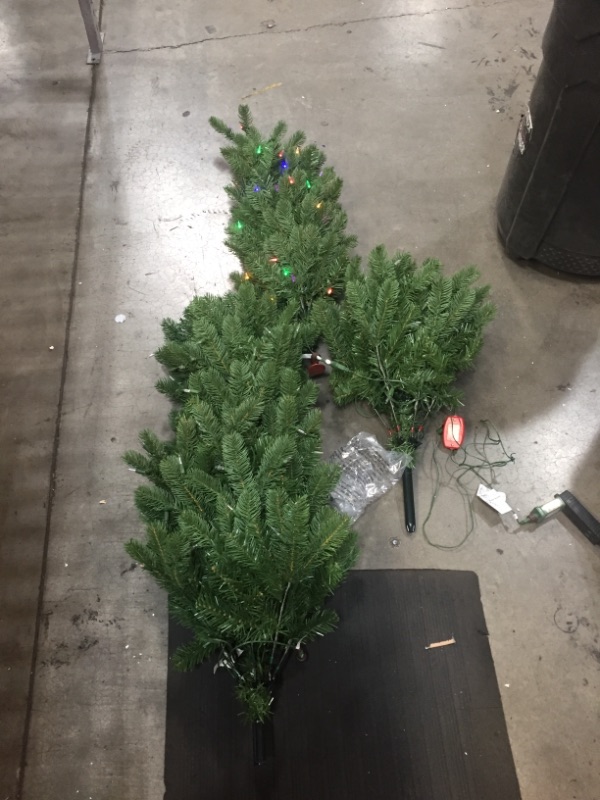 Photo 2 of //TESTED AND FUNCTIONAL, LIGHTS AT BASE OF TREE DO NOT LIGHT UP 
National Tree Company Multi-color Prelit LED Green Pencil Christmas Tree, 6.5'
