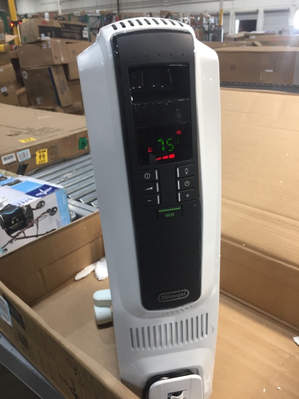 Photo 6 of //TESTED AND TURNS ON BUT DOES NOT FUNCTION, MINOR DAMAGE WITH TOP GRILL COMING OFF PARTS ONLY // 
De'Longhi DeLonghi TRD40615E Full Room Radiant Heater, 27.20 x 15.80 x 9.20, White
