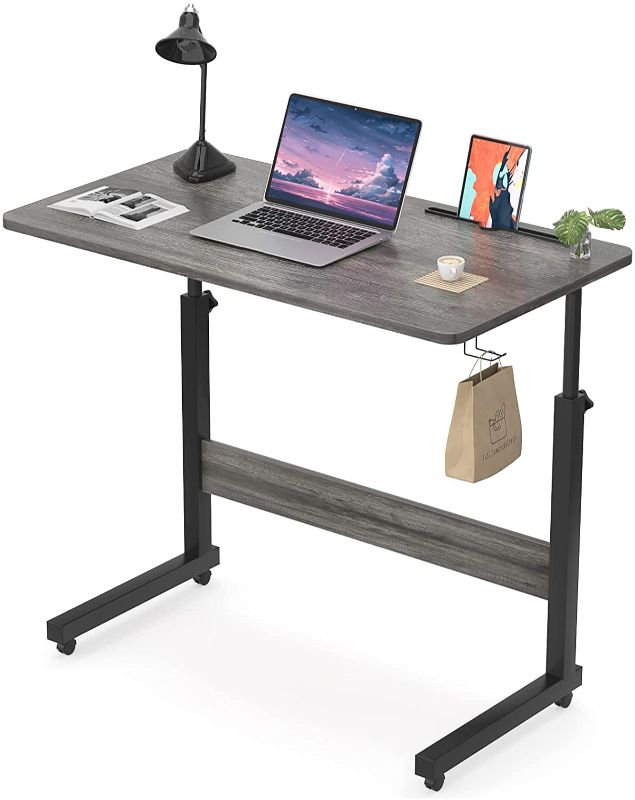 Photo 1 of Armocity Height Adjustable Desk, 32" Manual Standing Desk Small Mobile Rolling Computer Desk with Wheels and Hook, Portable Laptop Table for Home Office Living Room Bedroom, Grey
