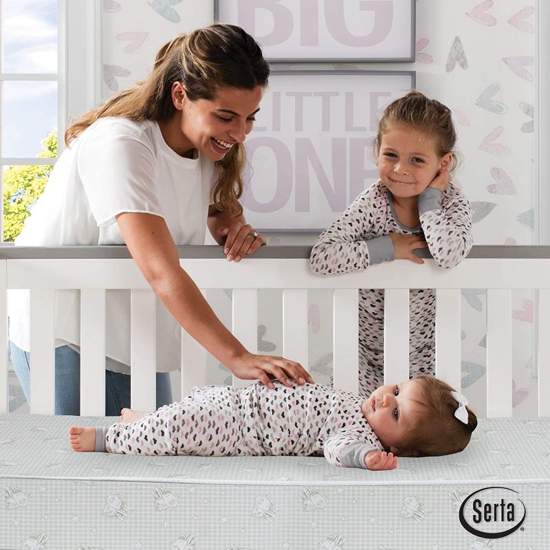 Photo 1 of **DAMAGED**
Serta Perfect Slumber Dual Sided Crib and Toddler Mattress - Premium Sustainably Sourced Fiber Core - Waterproof - GREENGUARD Gold Certified