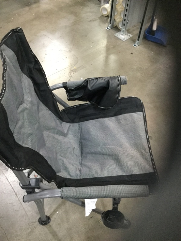 Photo 1 of **stock photo for reference only***
Camping Folding Chair Padded Quad Arm Chair with Cup Holder, Side Organizer 
**cut on bottom of seat see pictures**