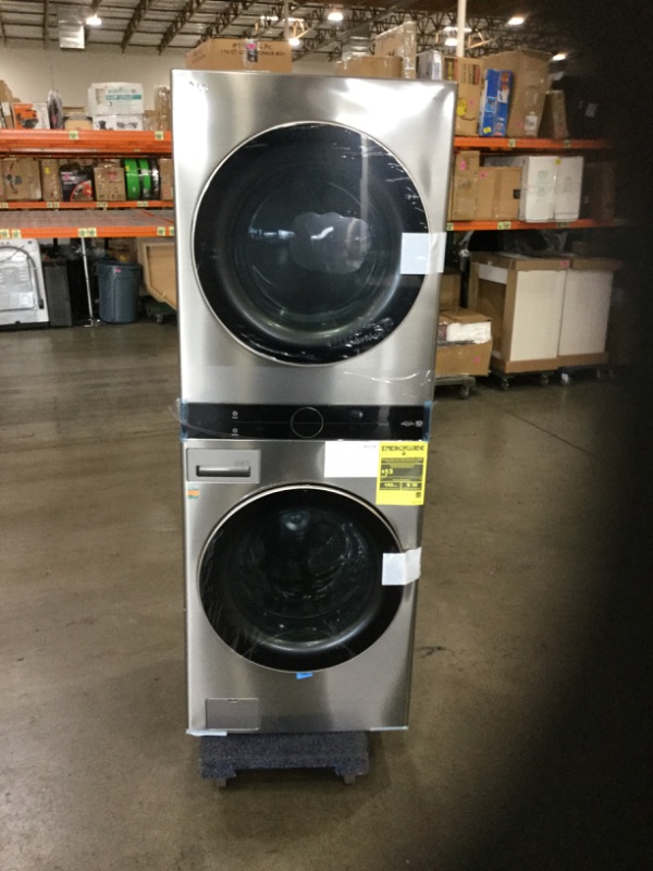 Photo 4 of 27 in. Graphite Steel WashTower Laundry Center with 4.5 cu. ft. Front Load Washer and 7.4 cu. ft. Gas Dryer
by LG Electronics
**minor damage to top** 
