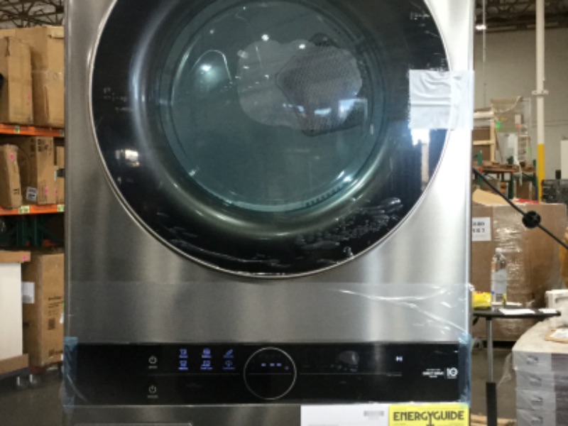 Photo 1 of 27 in. Graphite Steel WashTower Laundry Center with 4.5 cu. ft. Front Load Washer and 7.4 cu. ft. Gas Dryer
by LG Electronics
**minor damage to top** 
