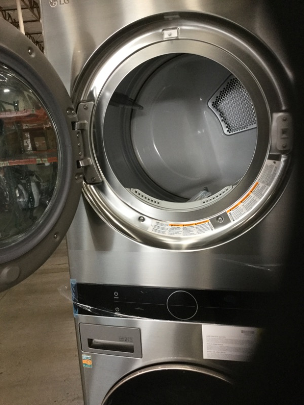 Photo 10 of 27 in. Graphite Steel WashTower Laundry Center with 4.5 cu. ft. Front Load Washer and 7.4 cu. ft. Gas Dryer
by LG Electronics
**minor damage to top** 
