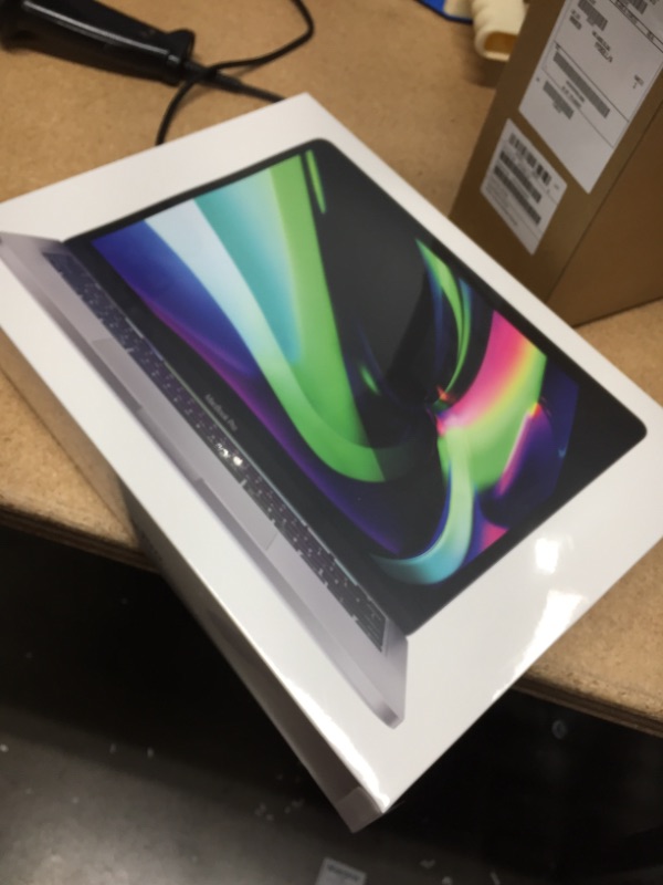 Photo 2 of 2020 Apple MacBook Pro with Apple M1 Chip (13-inch, 8GB RAM, 256GB SSD Storage) - Space Gray....****FACTORY SEALED/STRAPPED****
Item was Open to Verify Contents