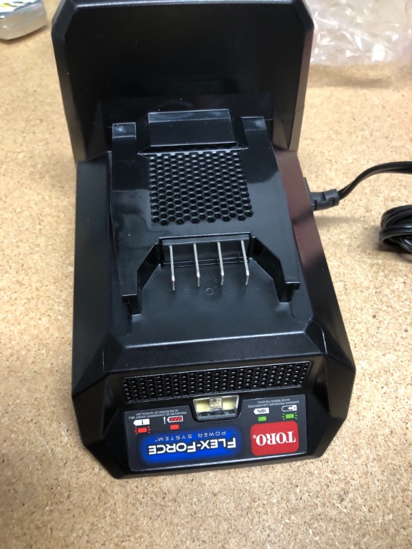 Photo 2 of Toro
Flex-Force Power System 60-Volt MAX Lithium-Ion Battery Charger