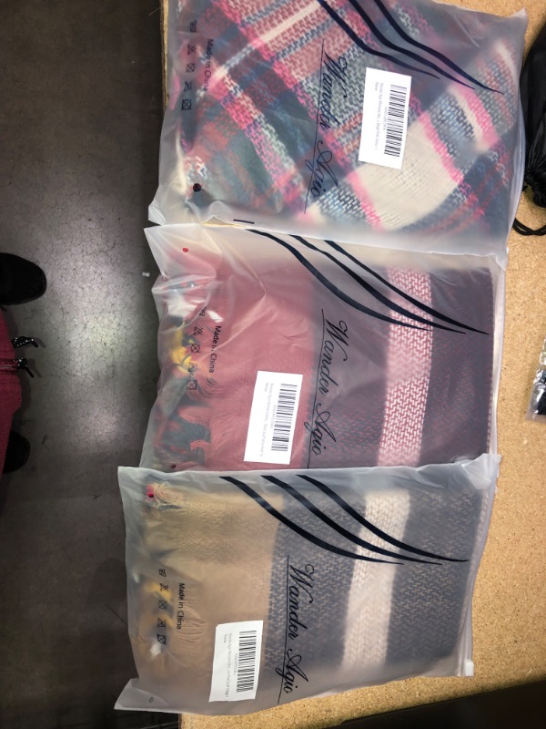 Photo 1 of BUNDLE OF ASSORTED PLAID SCARFS-SOLD AS IS, NO RETURNS