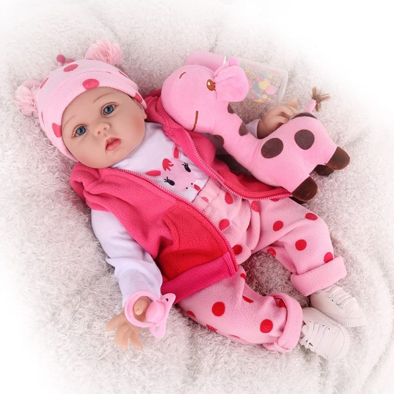 Photo 1 of CHAREX Reborn Baby Dolls, 22 inches Newborn Lifelike Soft Silicone Baby Dolls, Weighted Toddler Girl
