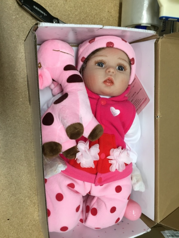 Photo 2 of CHAREX Reborn Baby Dolls, 22 inches Newborn Lifelike Soft Silicone Baby Dolls, Weighted Toddler Girl
