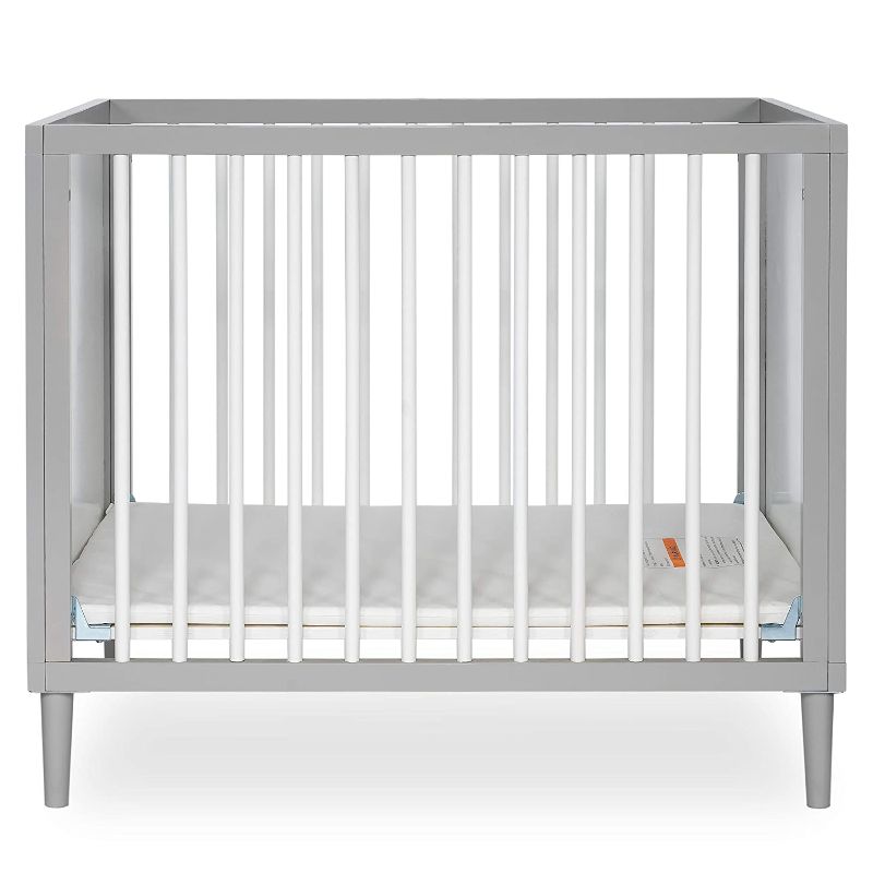 Photo 1 of Dream On Me Lucas Mini Modern Convertible Crib with Rounded Spindles, Mid- Century Meets Modern, Portable, Pebble Grey, 37.5 lb
