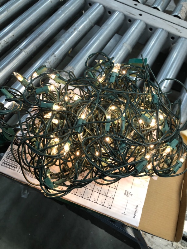 Photo 3 of *100-light set factory sealed*
Home Accents Holiday 48 in. x 72 in. 150-Light Mini Multi Color Smooth Net Cap Lights and 65.3 ft. 100-Light LED Smooth C9 Multi-Spool Super Bright (2 sets of 50 lights)
