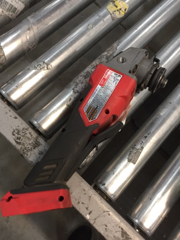 Photo 2 of *USED*
*MISSING components*
Milwaukee M18 FUEL 18-Volt Lithium-Ion Brushless Cordless 4-1/2 in./5 in. Grinder w/Paddle Switch (Tool-Only)

