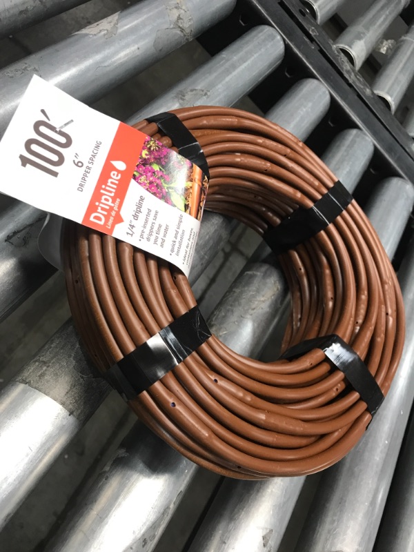 Photo 1 of DIG 1/4 in. Emitter Tubing 100 Ft. W/6 in. Spacing in Brown, Browns / Tans
