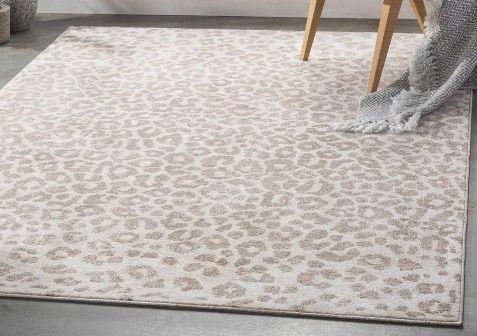 Photo 1 of *Stock photo for reference only*
5'3"x7'3" light cheetah print carpet rug