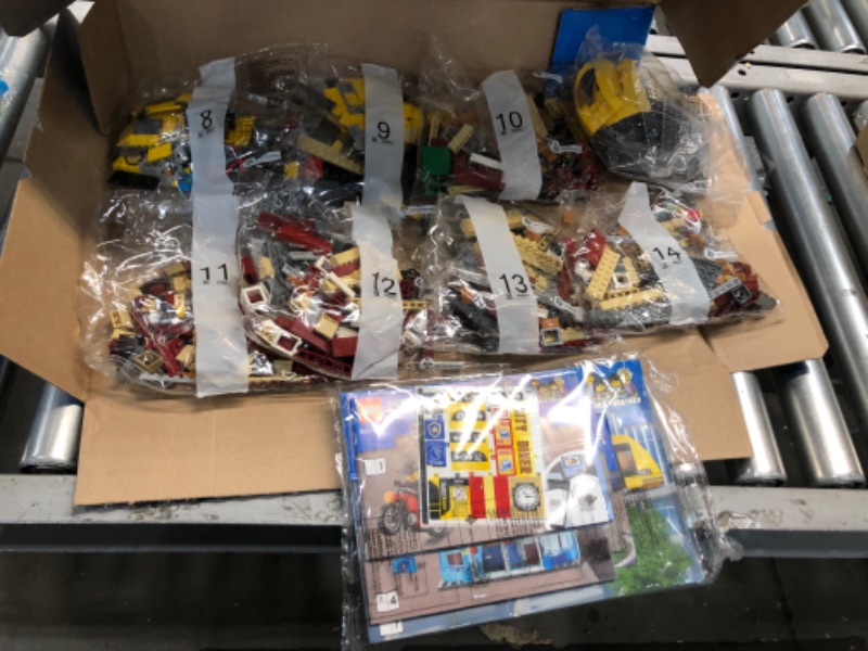 Photo 2 of LEGO City Main Square 60271 Set, Cool Building Toy for Kids, New 2021 (1,517 Pieces)
