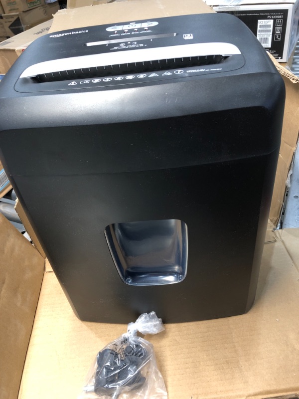 Photo 2 of Amazon Basics 12-Sheet High-Security Micro-Cut Paper, CD, and Credit Card Shredder with Pullout Basket
