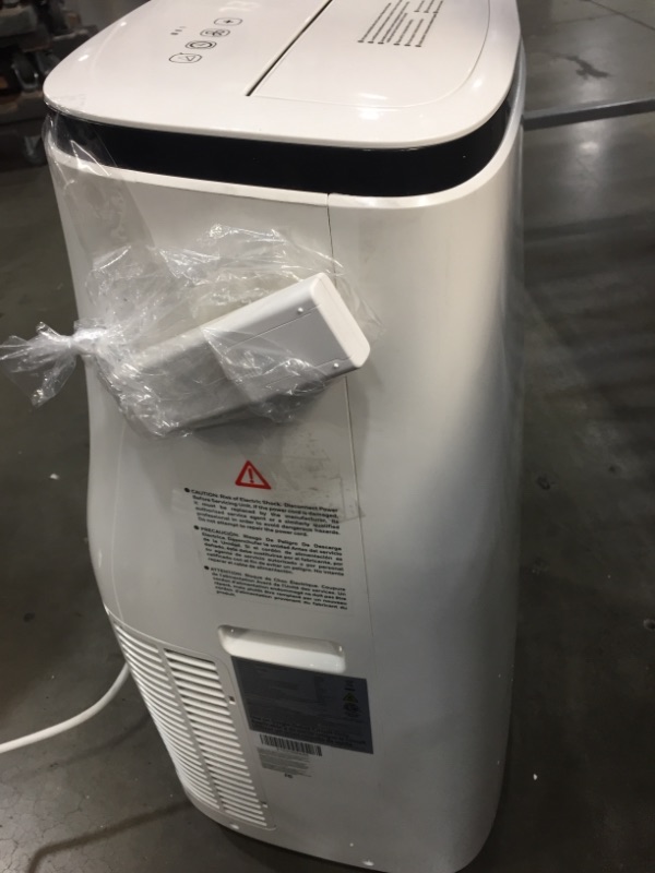 Photo 1 of Honeywell 14,000 BTU Portable Air Conditioner with Dehumidifier & Fan Cools Rooms Up To 700 Sq. Ft. with Remote Control, HJ4CESWK9, White/Black

//TESTED AND FUNCTIONAL, MAKES NOISE WHEN ON 

