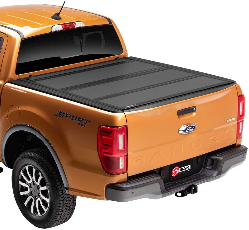 Photo 1 of BAK BAKFlip MX4 Hard Folding Truck Bed Tonneau Cover | Fits 1988 - 2013 Chevy/GMC Silverado/Sierra & C/K, 2014 2500/3500HD 6' 6" Bed (78")
- MODEL: 448101 - ***TEAR ON SIDE***