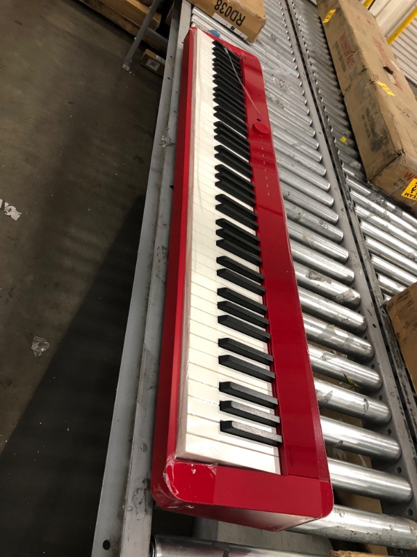Photo 1 of (CRACKED END; MISSING POWER CORDS)
Casio Portable Keyboard (PX-S1000RD)