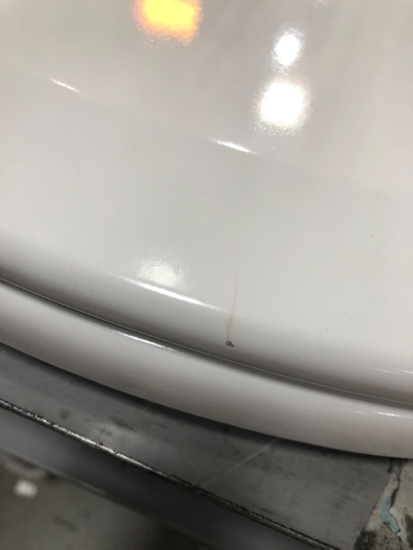 Photo 3 of (BROKEN OFF PORTION OF HINGE; SCRATCHED EDGE)
bemis easy clean toilet seat