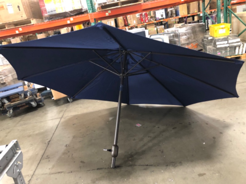 Photo 4 of (CRACKED PLASTIC TOP)
blissun 9' patio umbrella blue