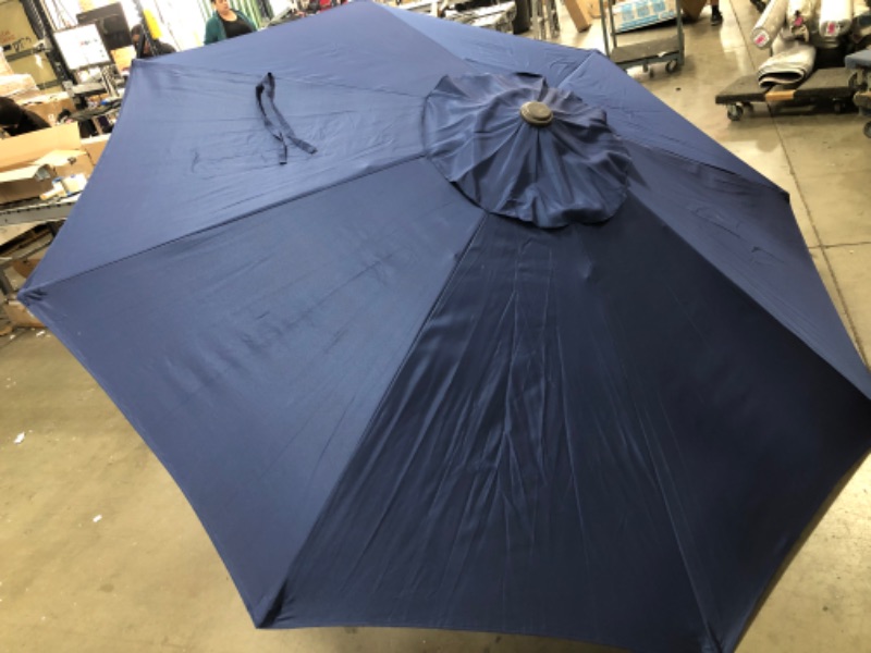 Photo 2 of (CRACKED PLASTIC TOP)
blissun 9' patio umbrella blue